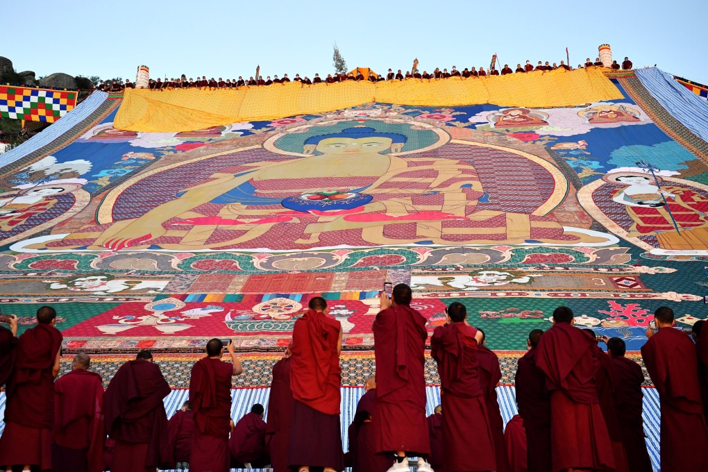 The “sunning of the Buddha” ceremony is held at the Drepung Monastery in Lhasa in August. A senior official said there would be an “orderly” opening up in Tibet. Photo: Xinhua