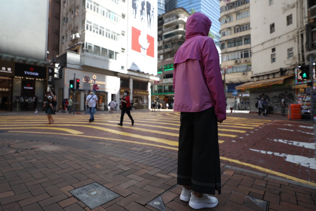The mother of Poon Hiu-wing, who was killed by her boyfriend during a trip to Taiwan in 2018, is photographed in Causeway Bay. Photo: Xiaomei Chen
