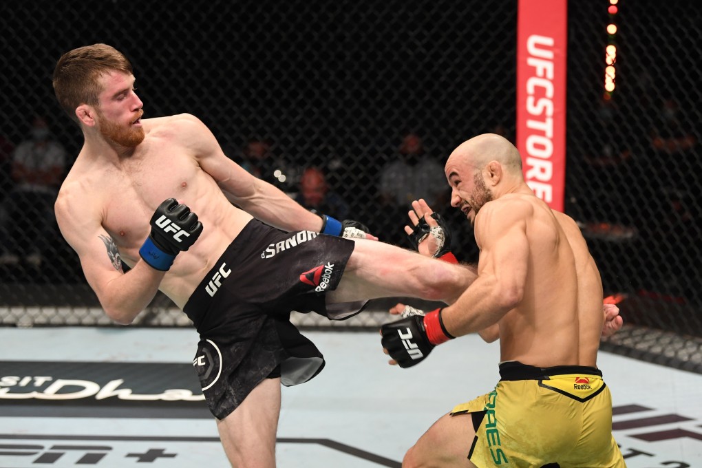 Cory Sandhagen kicks Marlon Moraes in their bantamweight bout during the UFC Fight Night event inside Flash Forum on UFC Fight Island on October 11, 2020 in Yas Island, Abu Dhabi. Photos: Josh Hedges/Zuffa LLC via Getty Images
