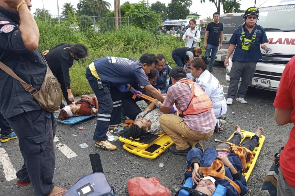 Rescuers treat the injured. Photo: AP