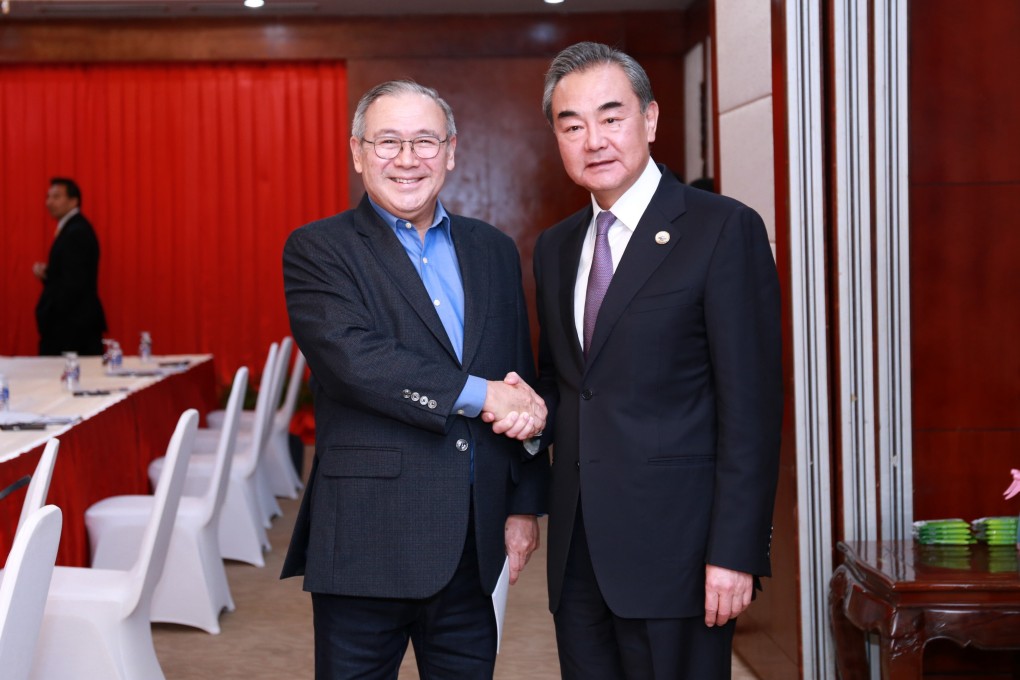 Teodoro Locsin and Wang Yi pictured in Laos earlier this year. Photo: Xinhua