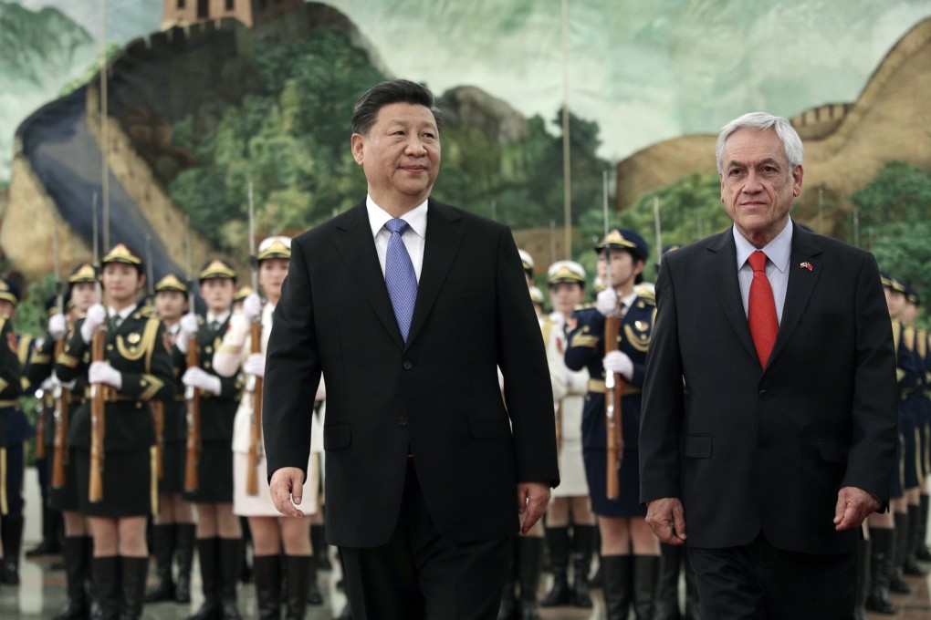 Chilean President Sebastian Pinera is seen with Chinese President Xi Jinping during his visit to Beijing last year. Photo: AFP