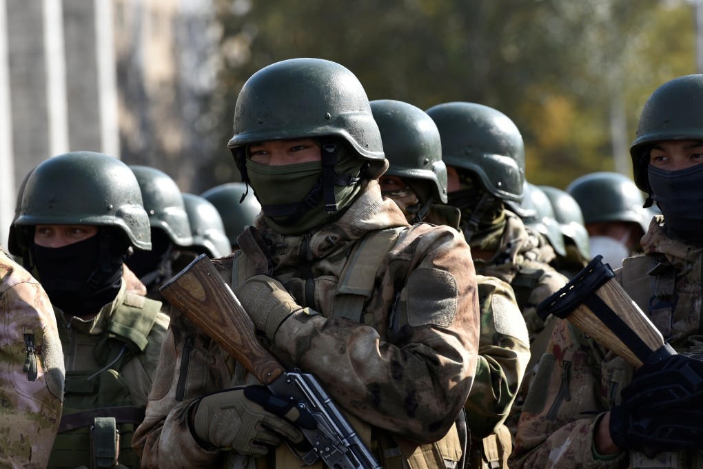 Members of the Kyrgyz armed forces line up in Ala-Too Square in Bishkek on Saturday after a state of emergency was declared and the military called in. Photo: Reuters