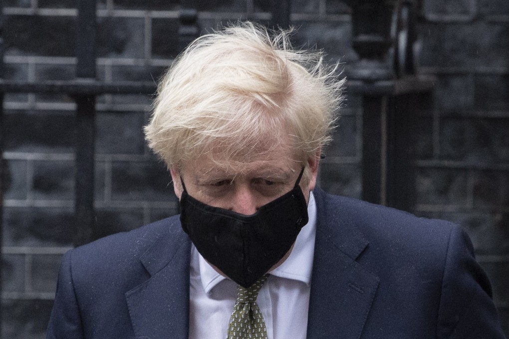 British Prime Minister Boris Johnson leaves 10 Downing Street to announce a three-tier coronavirus lockdown system in England. Photo: EPA-EFE