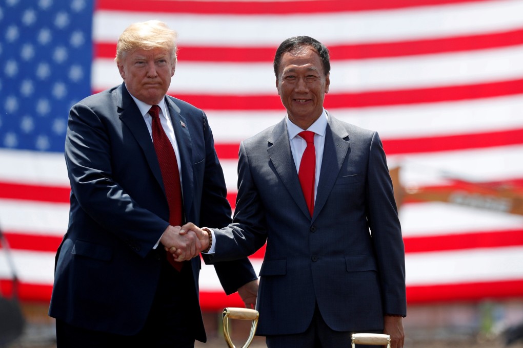 US President Donald Trump shakes hands with Foxconn Chairman Terry Gou during a ground breaking at Foxconn's new site in Mount Pleasant, Wisconsin on June 28, 2018. Photo: Reuters