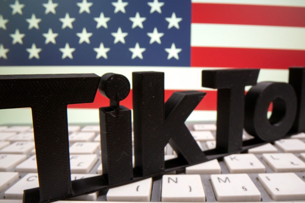 A 3D printed Tik Tok logo is placed on a keyboard in front of US flag in this illustration taken October 6, 2020. Photo: Reuters