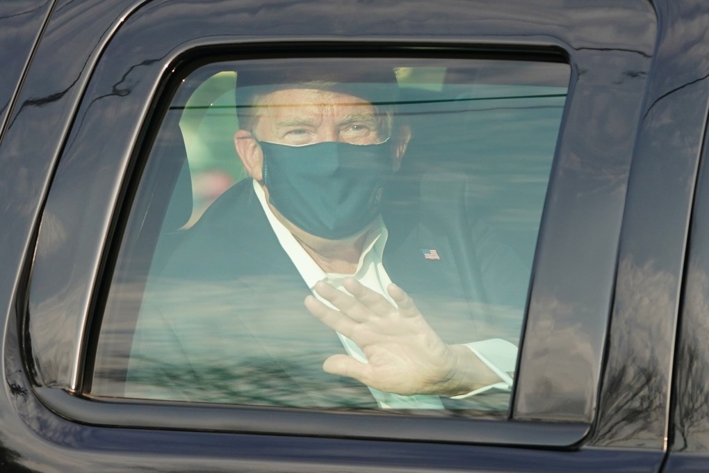 A Covid-19-infected Donald Trump takes a break from hospital in Bethesda, Maryland, on October 4. Photo: AFP