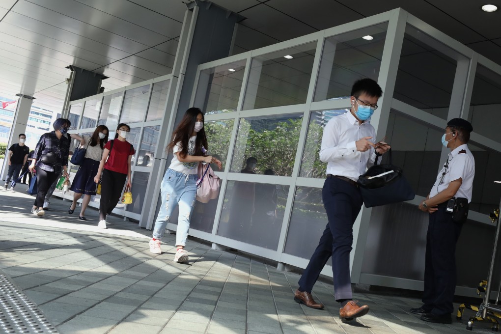 Civil servants return to their offices in Admiralty on May 4. Reports that Hong Kong civil servants will be required to pledge their loyalty to the city have sparked concerns about erosion of their civil liberties. Photo: Nora Tam