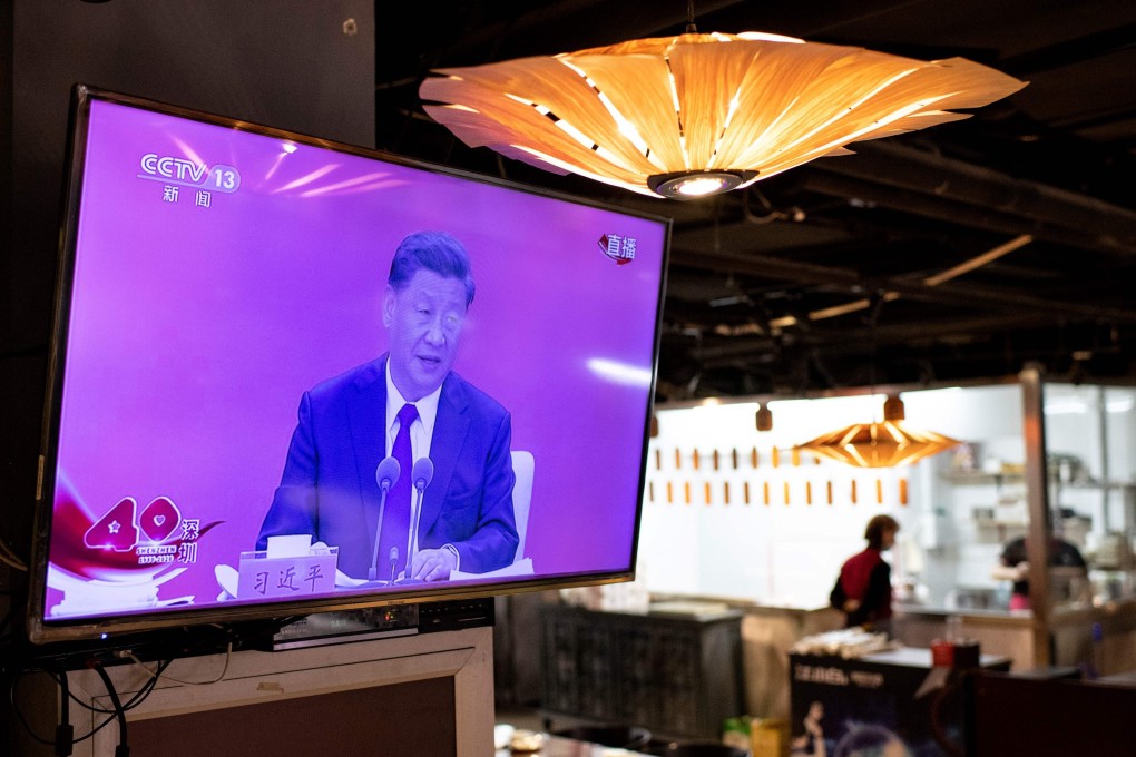 A broadcast of President Xi Jinping’s speech is shown on a television at a Beijing restaurant on Wednesday. Photo: AFP
