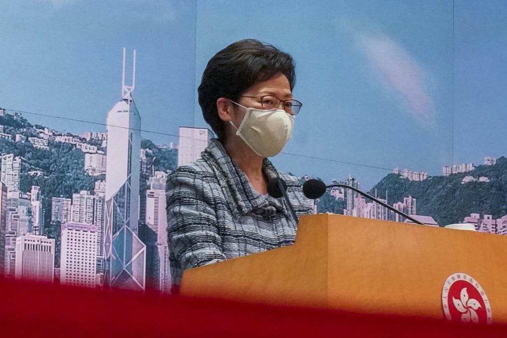 Hong Kong Chief Executive Carrie Lam announces the delay to her annual policy address on Monday. Photo: Felix Wong