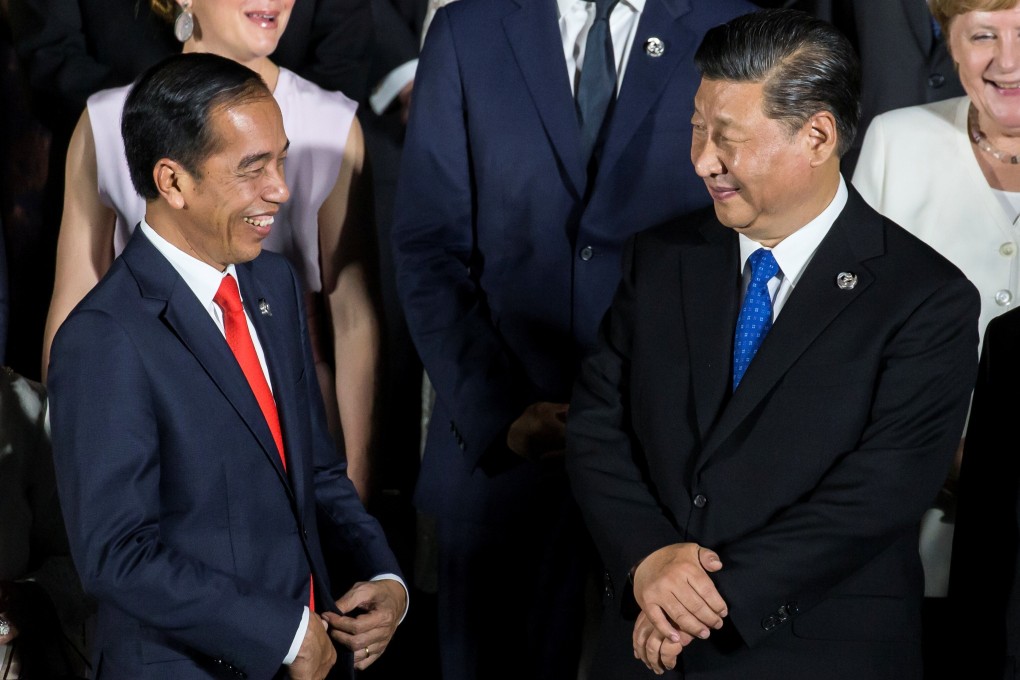 President Joko Widodo of Indonesia with President Xi Jinping of China at the G20 summit in Osaka in 2019. Indonesia has seen rapid investment by China under Widodo’s administration. Photo: Reuters