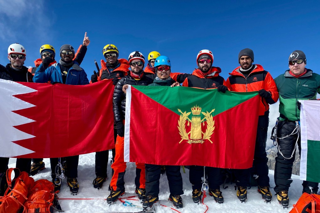 An 18-member party of the Bahrain Royal Guard mountaineering team pose for photographs on Mount Lobuche East, a 6,119-metre Himalayan peak in Nepal they scaled in training for a successful ascent of 8,163-metre Mount Manaslu, the world’s eighth highest peak. Photo: AFP/Tashi Lakpa Sherpa/Seven Summit Treks