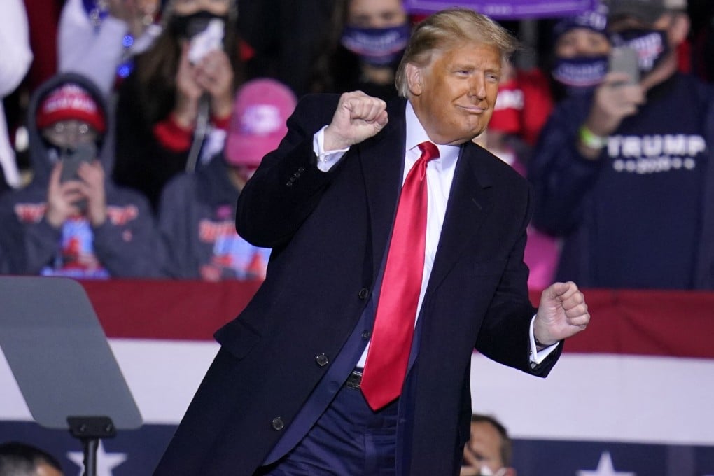 President Donald Trump dances to the song YMCA as he finishes a campaign rally in Johnstown, Pennsylvania. Photo: AP
