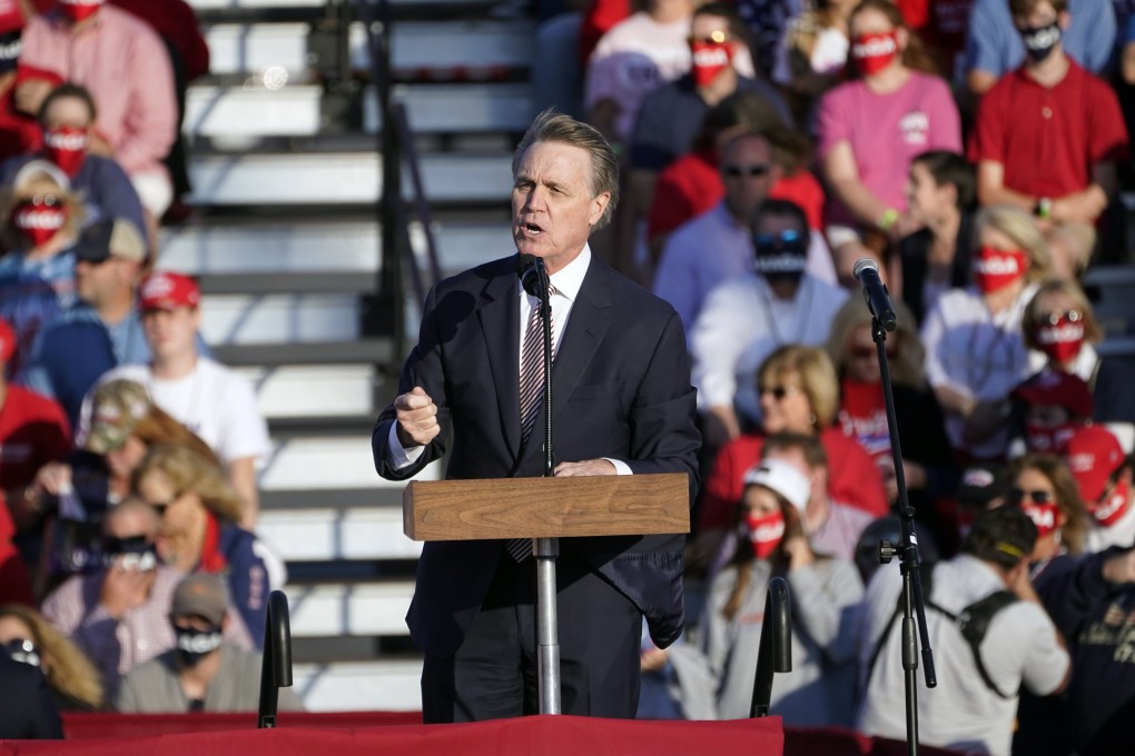 Senator David Perdue speaks during a campaign rally for US President Donald Trump at Middle Georgia Regional Airport in Macon, Georgia, on October 16. Photo: AP