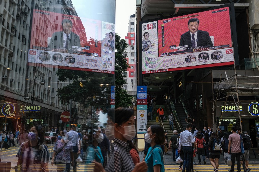 Chinese President Xi Jinping’s speech in Shenzhen is shown on a public screen in Hong Kong. Photo: Bloomberg