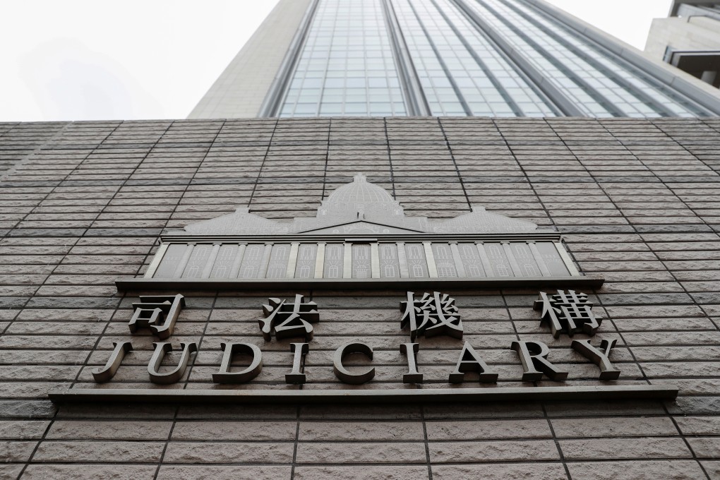 The logo of Judiciary of Hong Kong is seen outside West Kowloon Magistrates' Courts. Photo: Reuters