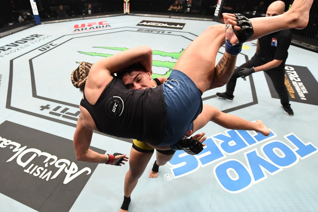 Jessica Andrade takes down Katlyn Chookagian in their women’s flyweight bout during UFC Fight Night inside Flash Forum on UFC Fight Island on October 18, 2020 in Abu Dhabi, United Arab Emirates. Photos: Josh Hedges/Zuffa LLC via Getty Images