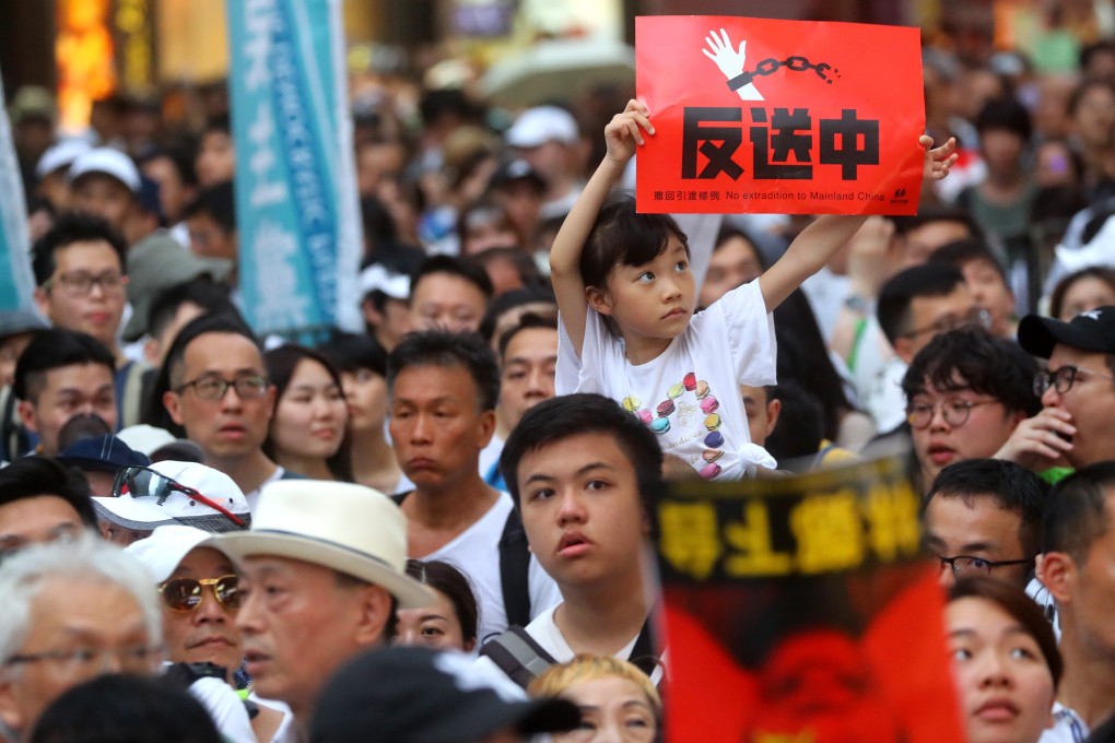 Hongkongers march in protest against a proposed extradition bill on June 9 last year. The now-withdrawn bill, which the government had tried to ram through the Legislative Council despite fierce opposition, triggered months of social unrest. Photo: Edmond So