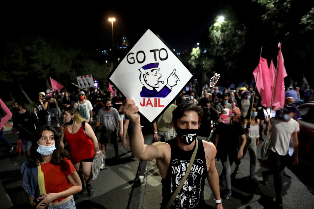 Protesters march outside his residence of Israeli Prime Minister Benjamin Netanyahu in Israel on Saturday. Photo: EPA-EFE