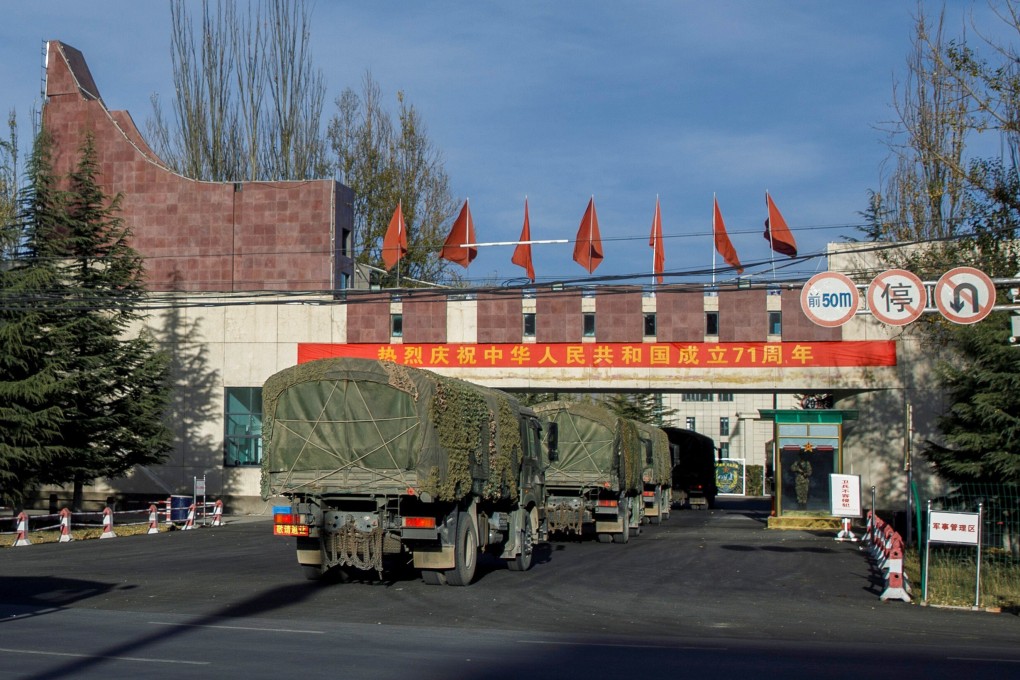 PLA trucks roll into an army base near Lhasa in Tibet on Friday. Photo: Reuters