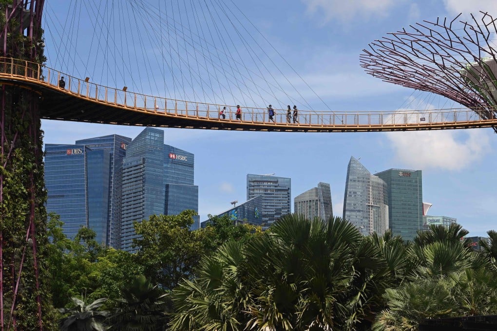 Visitors cross a skyway at Gardens by the Bay in Singapore. Hong Kong could have done much better for its first travel bubble than with Singapore, a city with a significant snooze factor. Photo: AFP