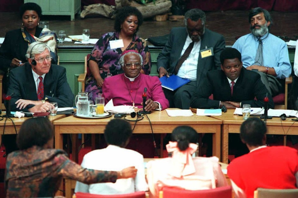 Archbishop Desmond Tutu (centre) and fellow commissioners listen to testimony during the South African Truth and Reconciliation Commission in London in April 1996. Picture: AFP
