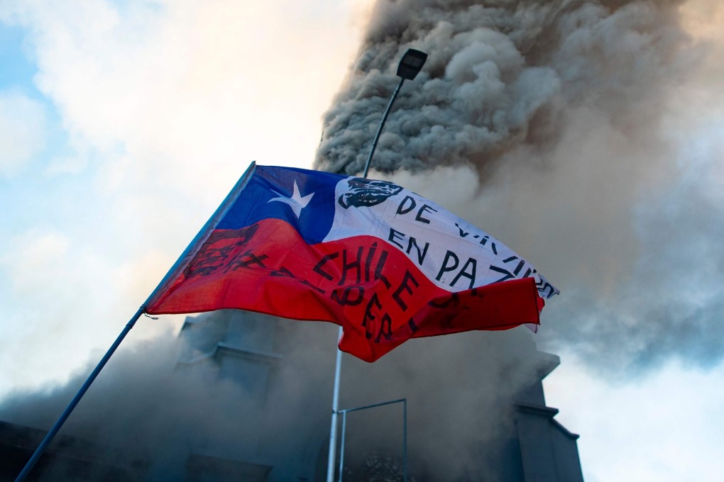 The burning church of Asuncion in Santiago, Chile. Photo: AFP