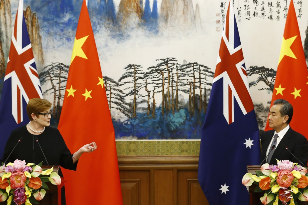 Australian Foreign Minister Marise Payne and Chinese Foreign Minister Wang Yi are seen after a meeting in Beijing in 2018. Photo: EPA-EFE