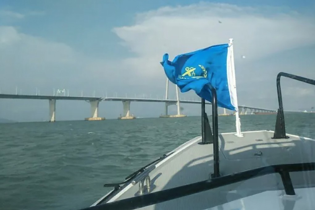 Maritime police arrested a dozen fishing enthusiasts at the Hong Kong-Zhuhai-Macau Bridge last week. Photo: Weibo