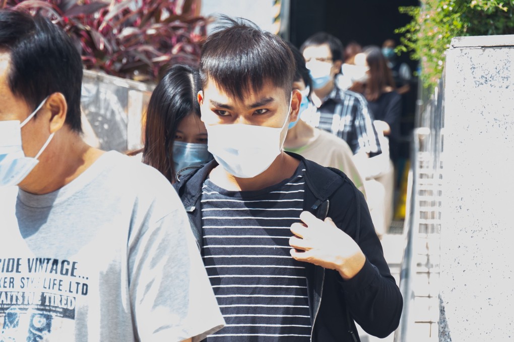 Lam Siu-hung, 21, said he was blackmailed into firebombing a police precinct by a man claiming to have nude photos of his girlfriend. Photo: Brian Wong