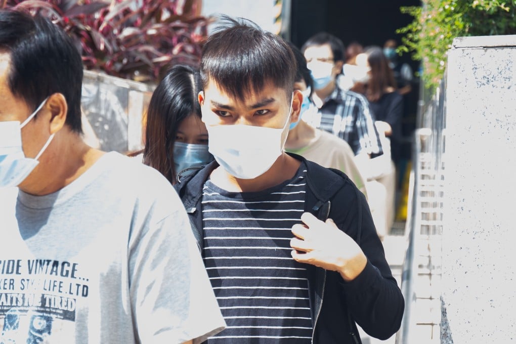 Lam Siu-hung, 21, said he was blackmailed into firebombing a police precinct by a man claiming to have nude photos of his girlfriend. Photo: Brian Wong