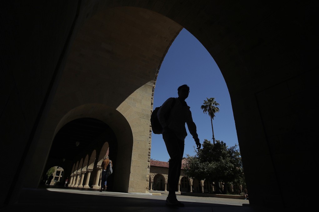People walk on campus at Stanford University in California in April 2019. The US Education Department is seeking to enforce a 1986 law requiring universities to disclose gifts and contracts from foreign sources. Photo: AP