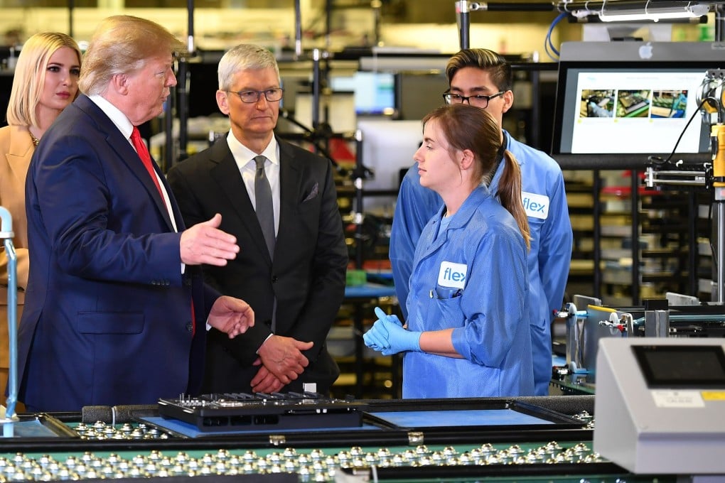 US President Donald Trump and Apple CEO Tim Cook tour the Flextronics manufacturing facility where Apple’s Mac Pros are assembled in Austin, Texas. Photo: AFP via Getty Images