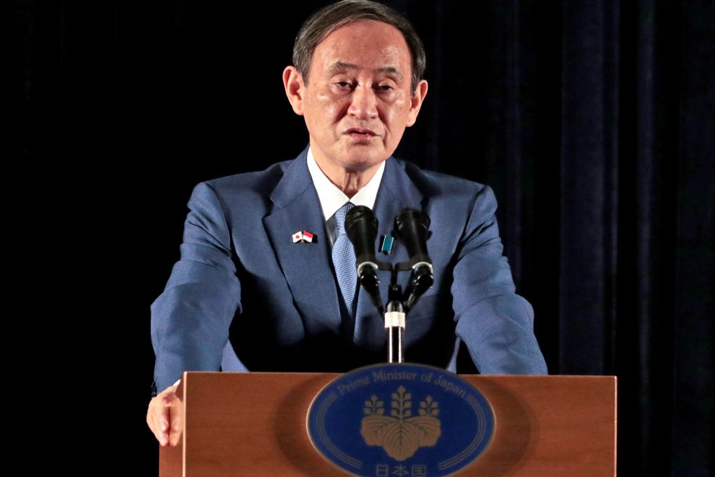 Japanese Prime Minister Yoshihide Suga speaks to the media during his visit to Jakarta, Indonesia, on October 21. Photo: Reuters