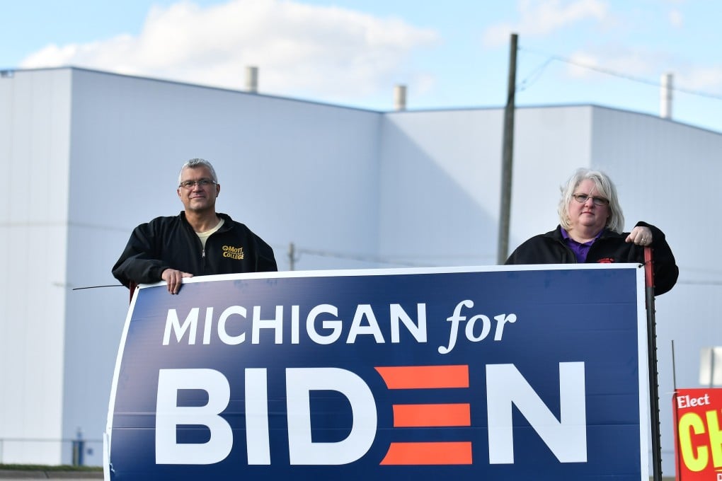 Auto workers at a General Motors plant in Flint, Michigan, show their support for Democratic candidate Joe Biden. Photo: TNS