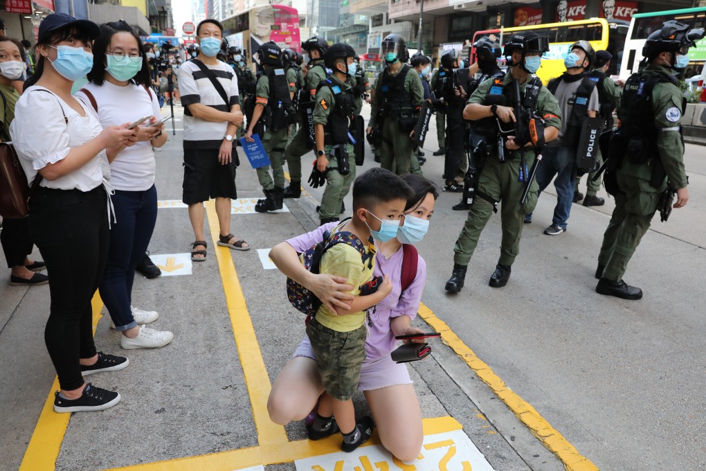 Hong Kong police officers stand guard in Mong Kok in response to calls on social media to stage anti-government protests and rally from Jordan to Mong Kok on what would have been the day of the Legislation Council election, on September 6. Photo: May Tse
