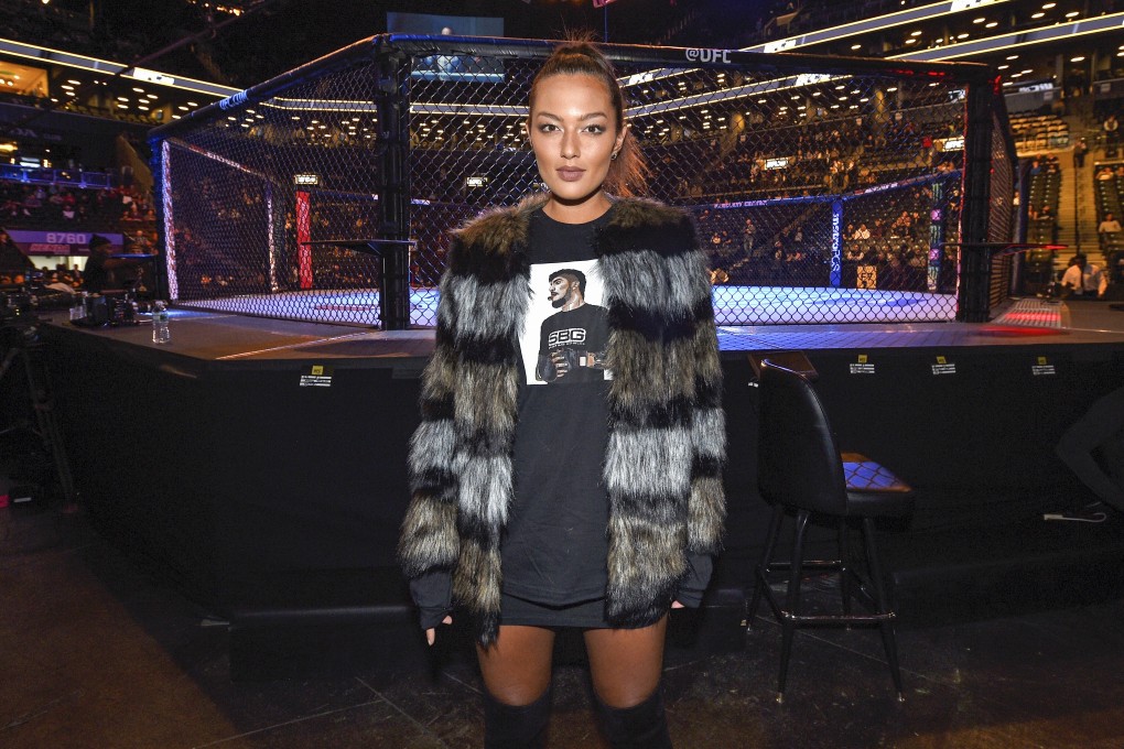 Model Mia Kang stands in front of the octagon before the UFC 208 event at the Barclays Centre in Brooklyn, New York. In her book Knockout, she tells how Muay Thai helped her finally beat the body issues she had endured since a teenager. Photo: Getty Images