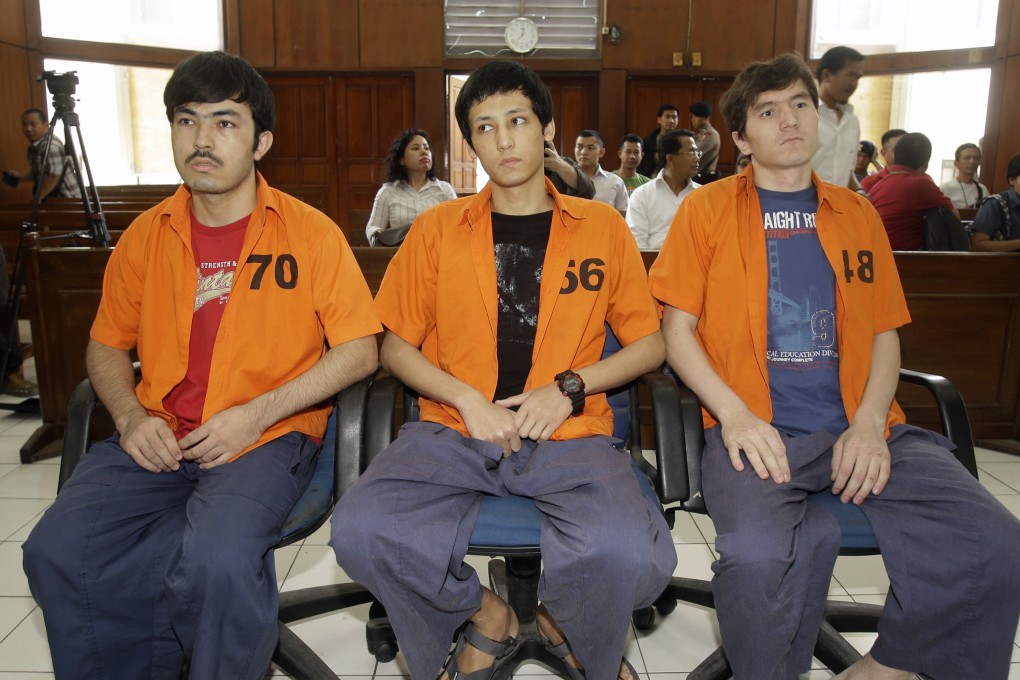 Abdulbasit Tuzer, Ahmet Mahmud and Altinci Bayyram at a hearing in Jakarta on July 13, 2015. Photo: AP