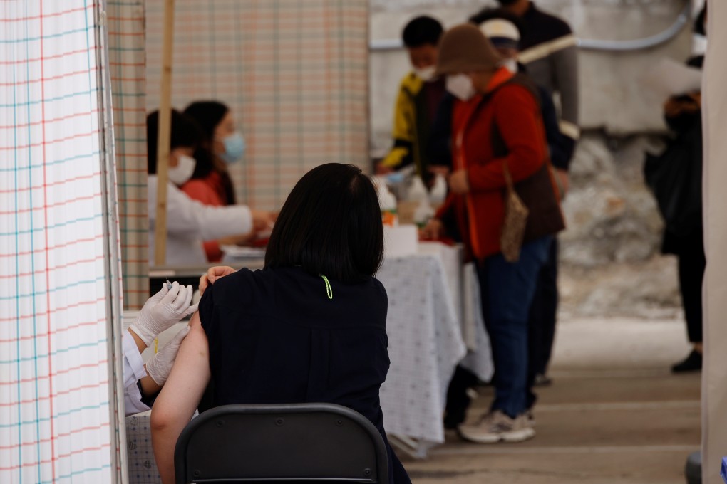 A woman gets an influenza vaccine at a hospital in Seoul, South Korea, on Wednesday. Photo: Reuters