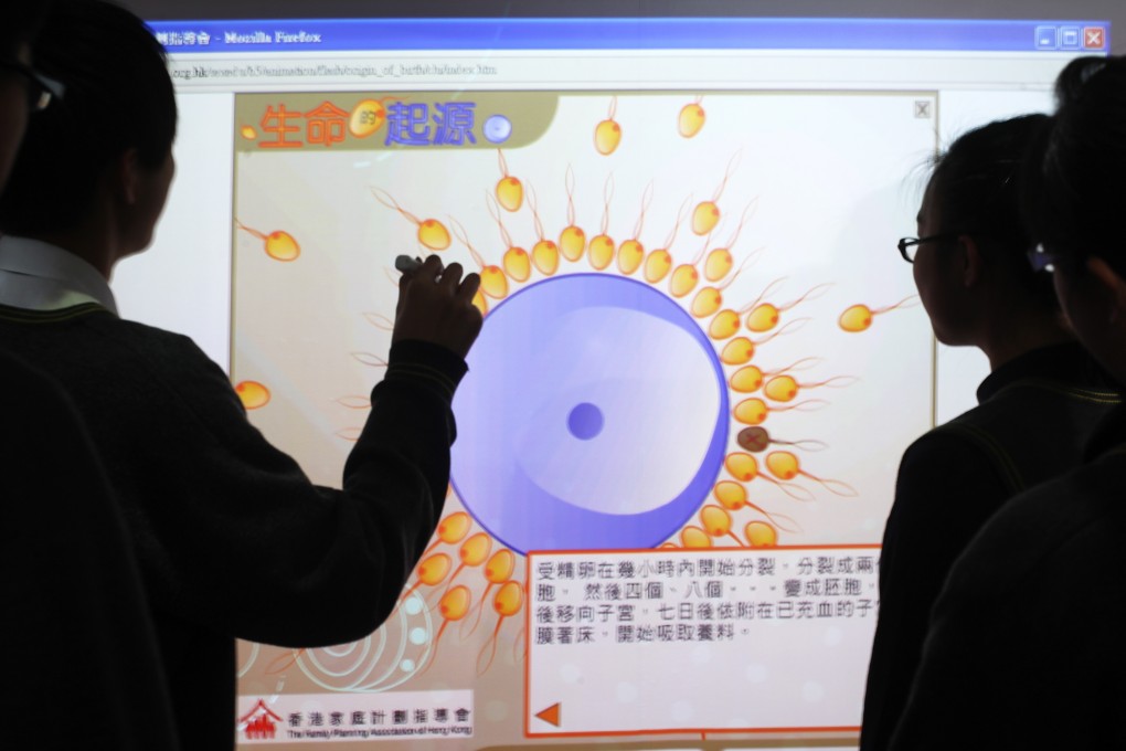 Students at a school in Tai Po take part in a game at a mobile sex education classroom run by the Family Planning Association. Photo: K.Y. Cheng