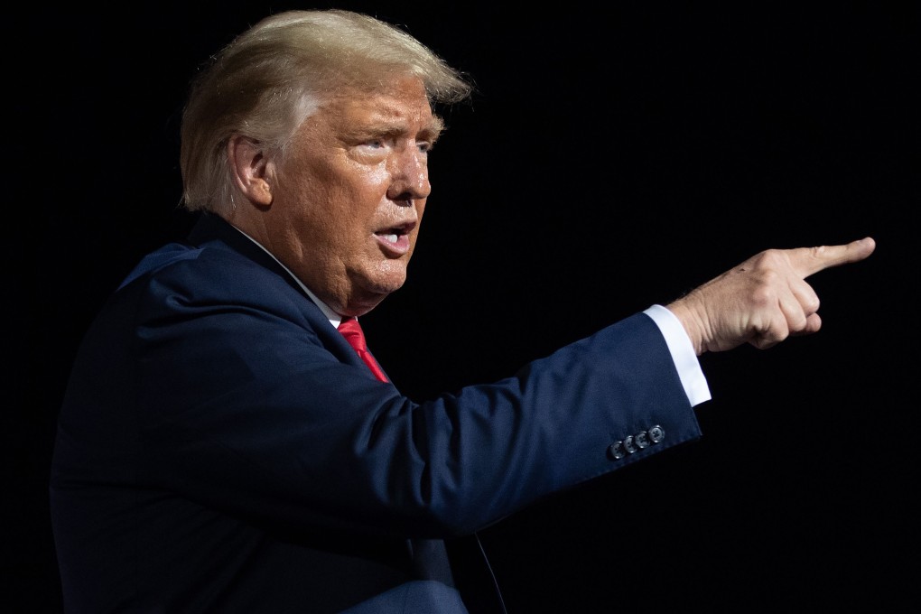 US President Donald Trump speaks at a Make America Great Again rally as he campaigns in North Carolina on Wednesday. Photo: AFP