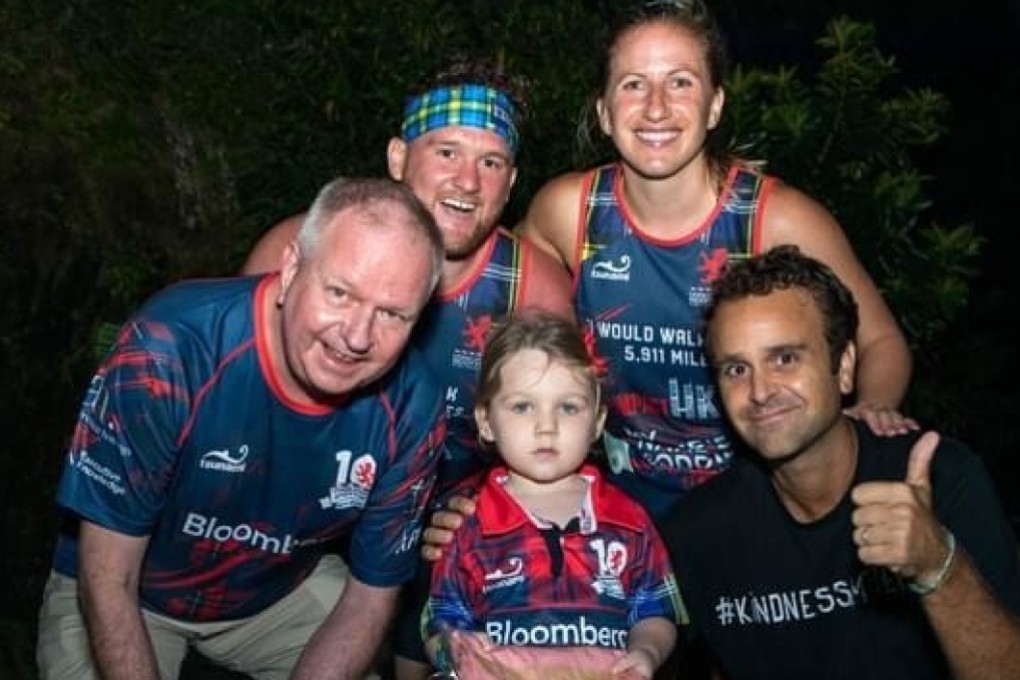 Harriet Fitzgerald (centre) was the youngest participant in Hong Kong Scottish’s “I would walk 5,911 challenge” at four years old. She walked 30 kilometres with her parents and is pictured with ImpactHK CEO Jeff Rotmeyer, Brad Tuff, Sarah Monaghan and Roy Kinnear. Photos: Handout