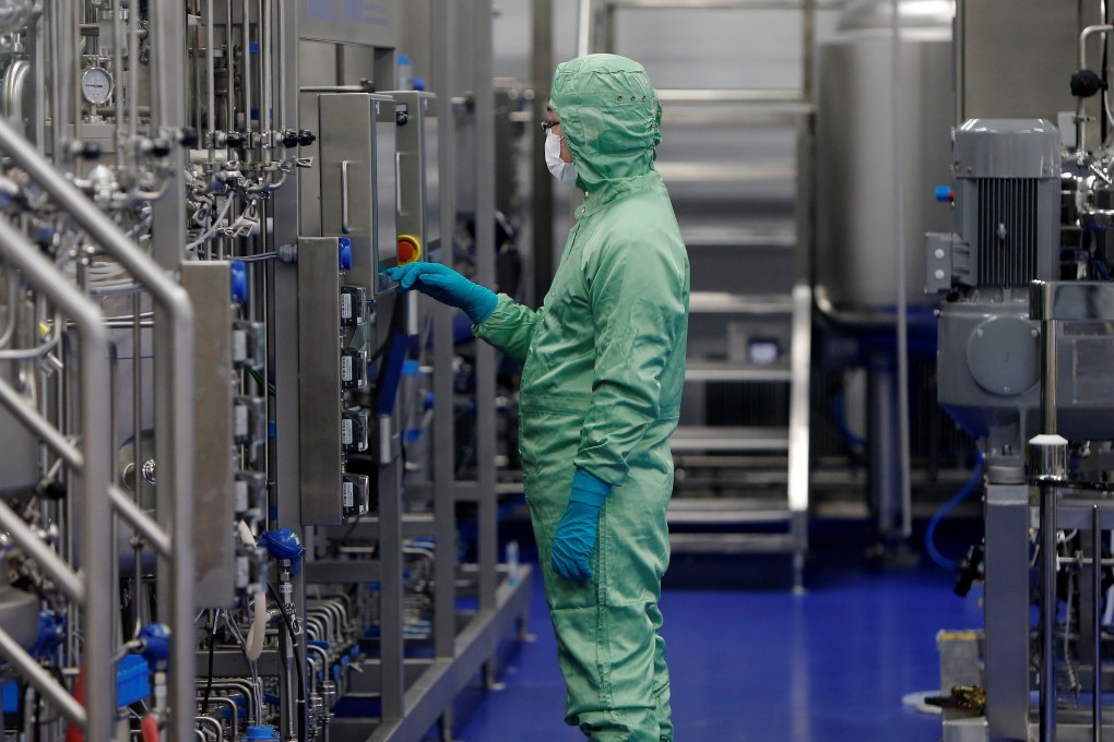 A technician works at a manufacturing facility of Chinese vaccine maker CanSino Biologics in Tianjin, China. The company is working with a fetal cell line called HEK293 to find a vaccine for Covid-19. Photo: AFP