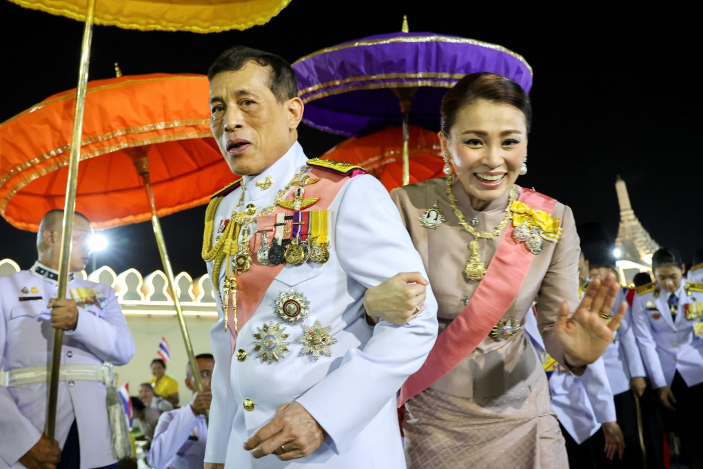 Thailand‘s King Maha Vajiralongkorn and Queen Suthida greet royalists as they leave a religious ceremony in Bangkok on Friday. Photo: Reuters
