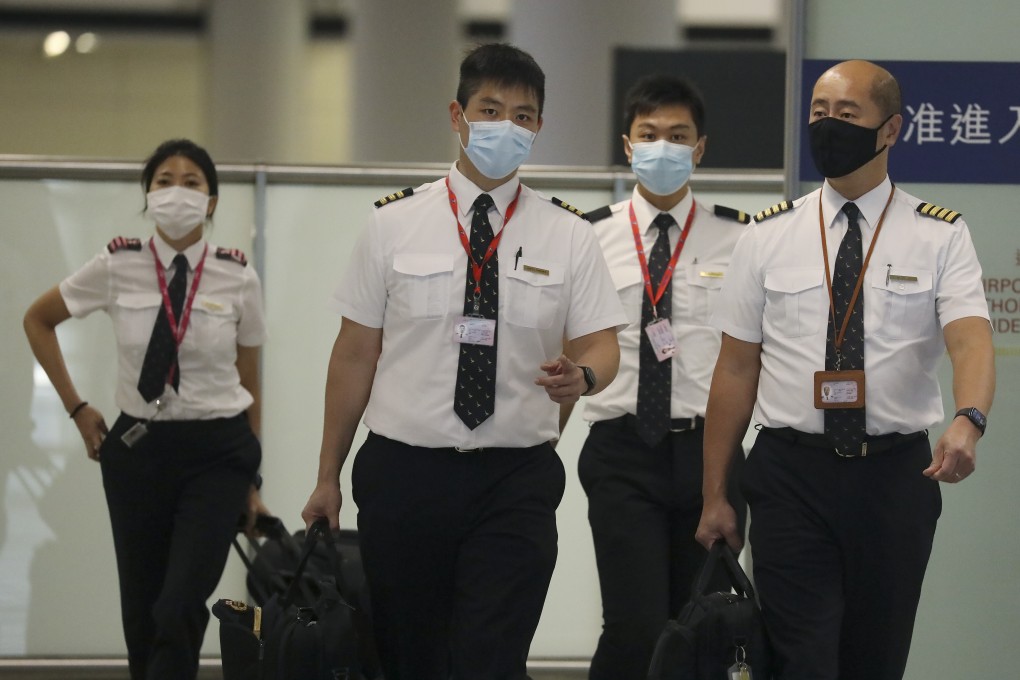 Cathay Pacific staff at Hong Kong International Airport. Photo: K. Y. Cheng
