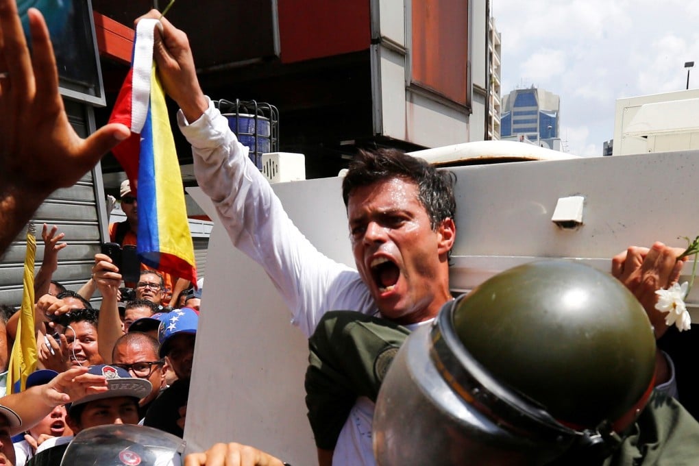 Venezuelan opposition leader Leopoldo Lopez gets into a National Guard armoured vehicle in Caracas in 2014. File photo: Reuters