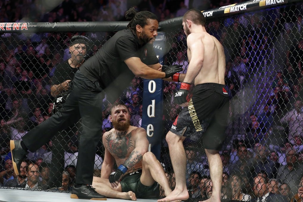 Khabib Nurmagomedov is held back by referee Herb Dean after submitting Conor McGregor at UFC 229 in Las Vegas. Photo: AP
