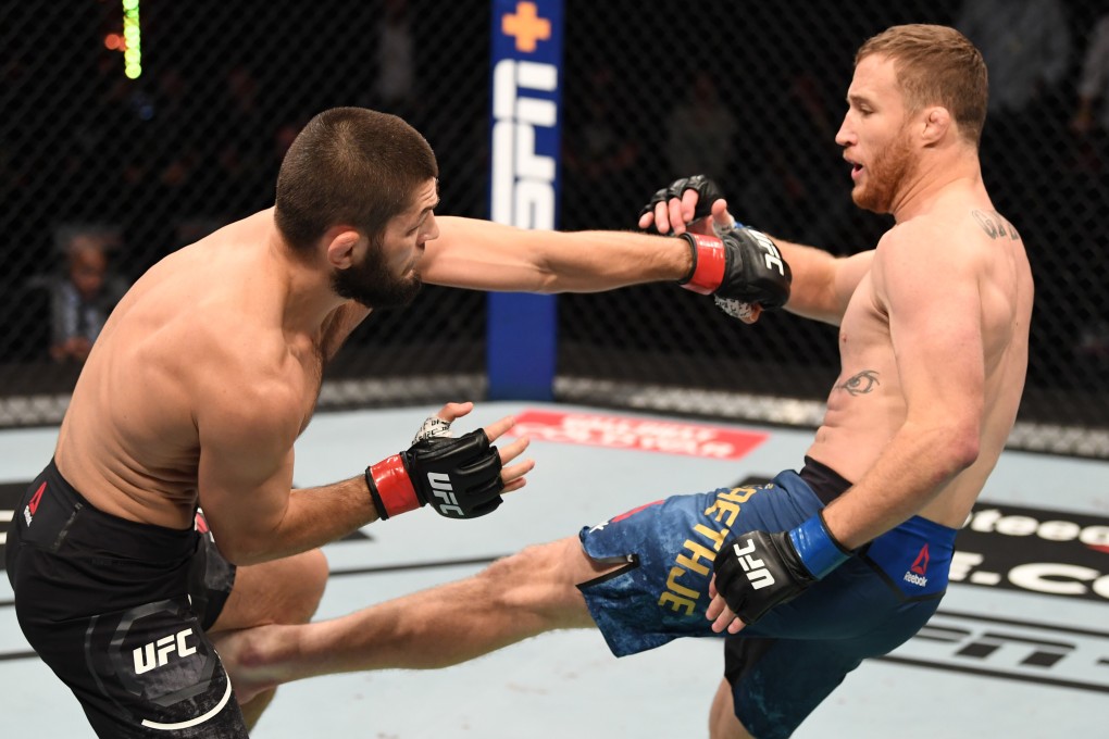 Justin Gaethje kicks Khabib Nurmagomedov in their lightweight title bout at UFC 254 on Fight Island in Abu Dhahi. Photos: Josh Hedges/Zuffa LLC via Getty Images