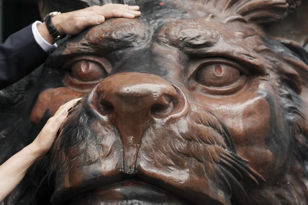 HSBC’s iconic lion sculptures, known as Stephen and Stitt (above), returned to public view at HSBC”s main building in Hong Kong last week after being under wraps for more than nine months in what has been a challenging period for the bank. Photo: Felix Wong