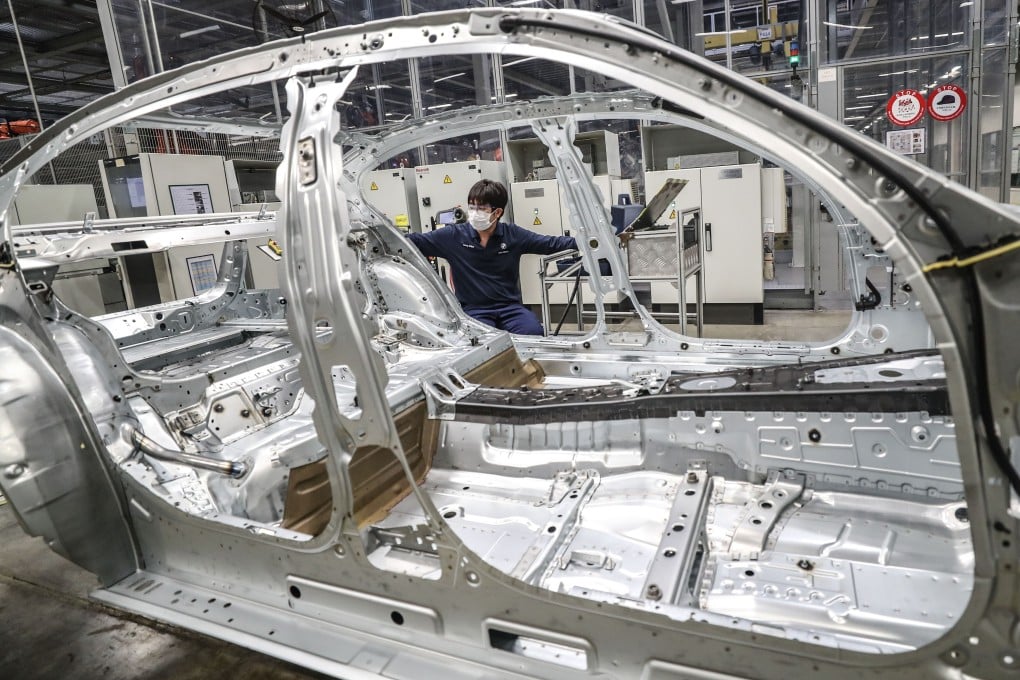 A man working at the Tiexi factory at BMW Brilliance Automotive (BBA) in the Liaoning provincial capital of Shenyang in north-eastern China on February 17, 2020. Photo: Xinhua